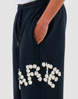 Pantalon à fleurs en crochet