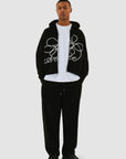 Sweat à capuche zippé avec logo fleuri