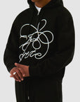 Sweat à capuche zippé avec logo fleuri