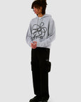 Sweat à capuche zippé avec logo fleuri