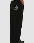 Pantalon à poches brodées