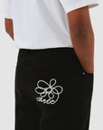 Pantalon à poches brodées