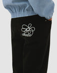 Pantalon à poches brodées