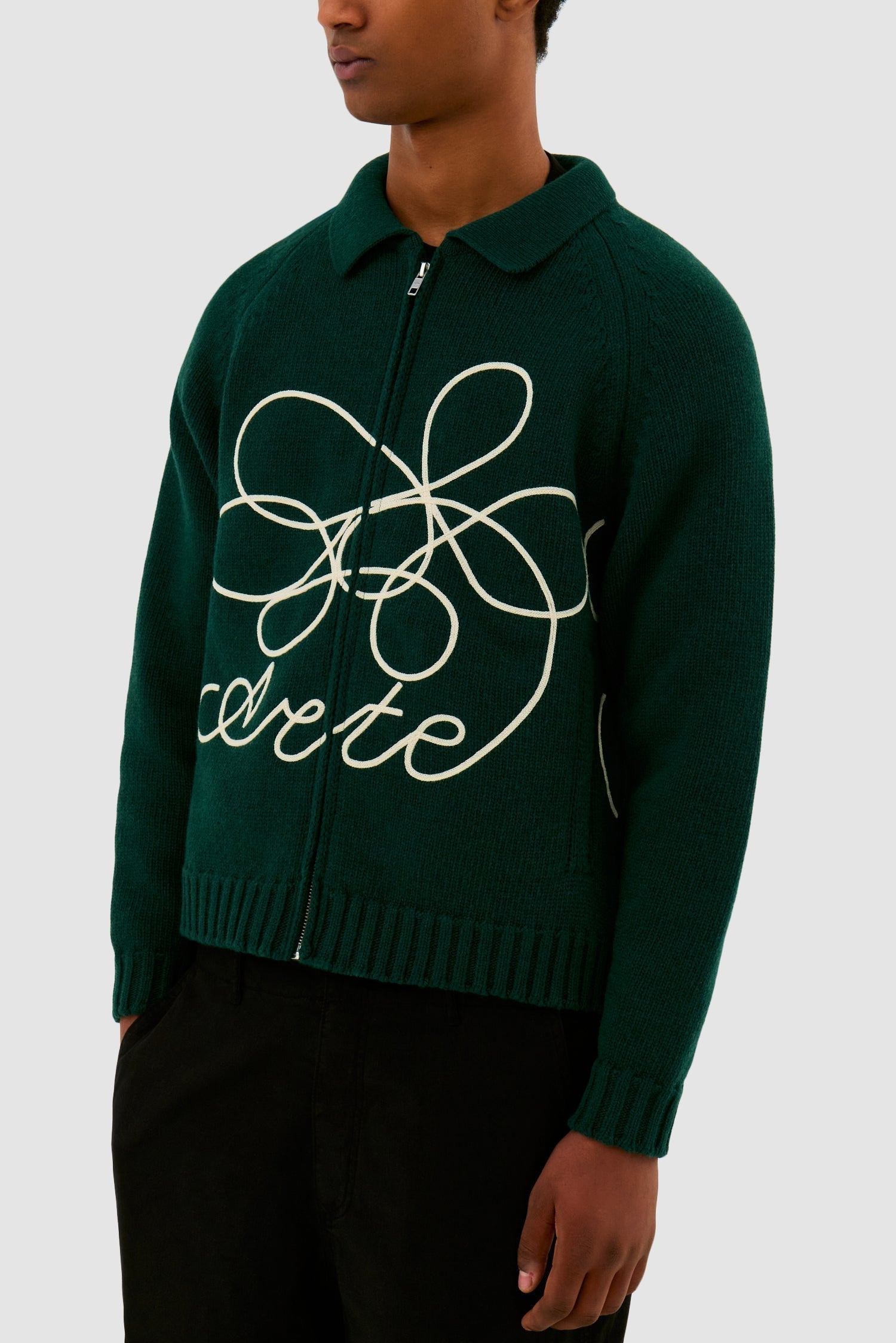 Pull en maille avec logo fleuri