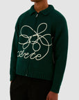 Pull en maille avec logo fleuri