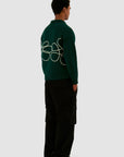 Pull en maille avec logo fleuri